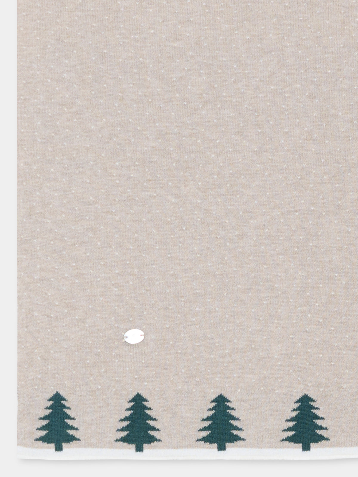 Couverture beige pour bébés en tricot avec des arbres