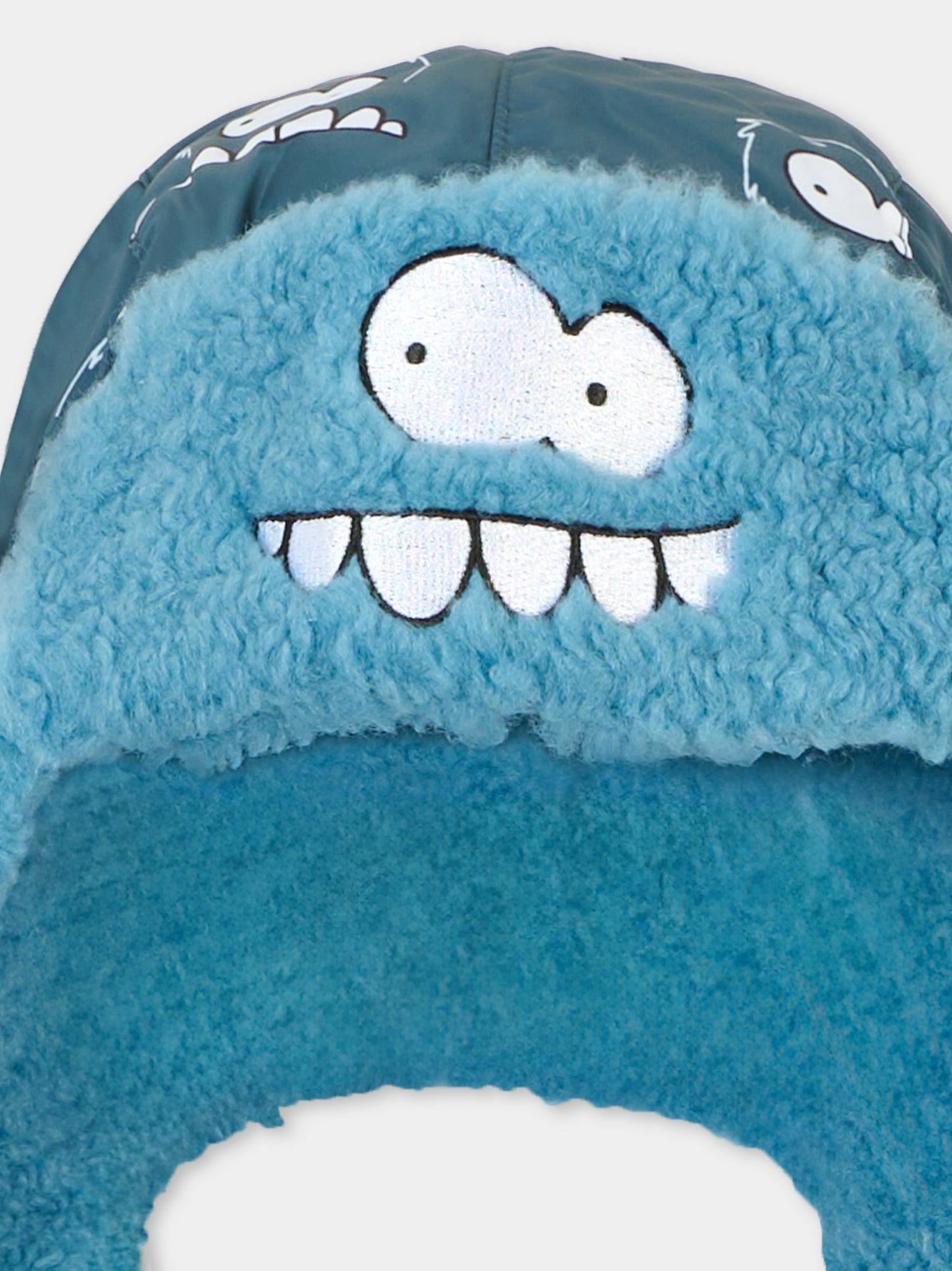 Berretto azzurro per bambino con mostro all over,Stella Mccartney Kids,TX0P77 Z3166 633MC