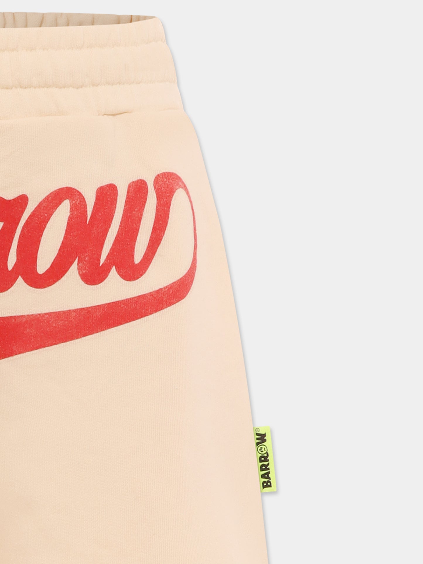 Short ivoire pour enfants avec logo