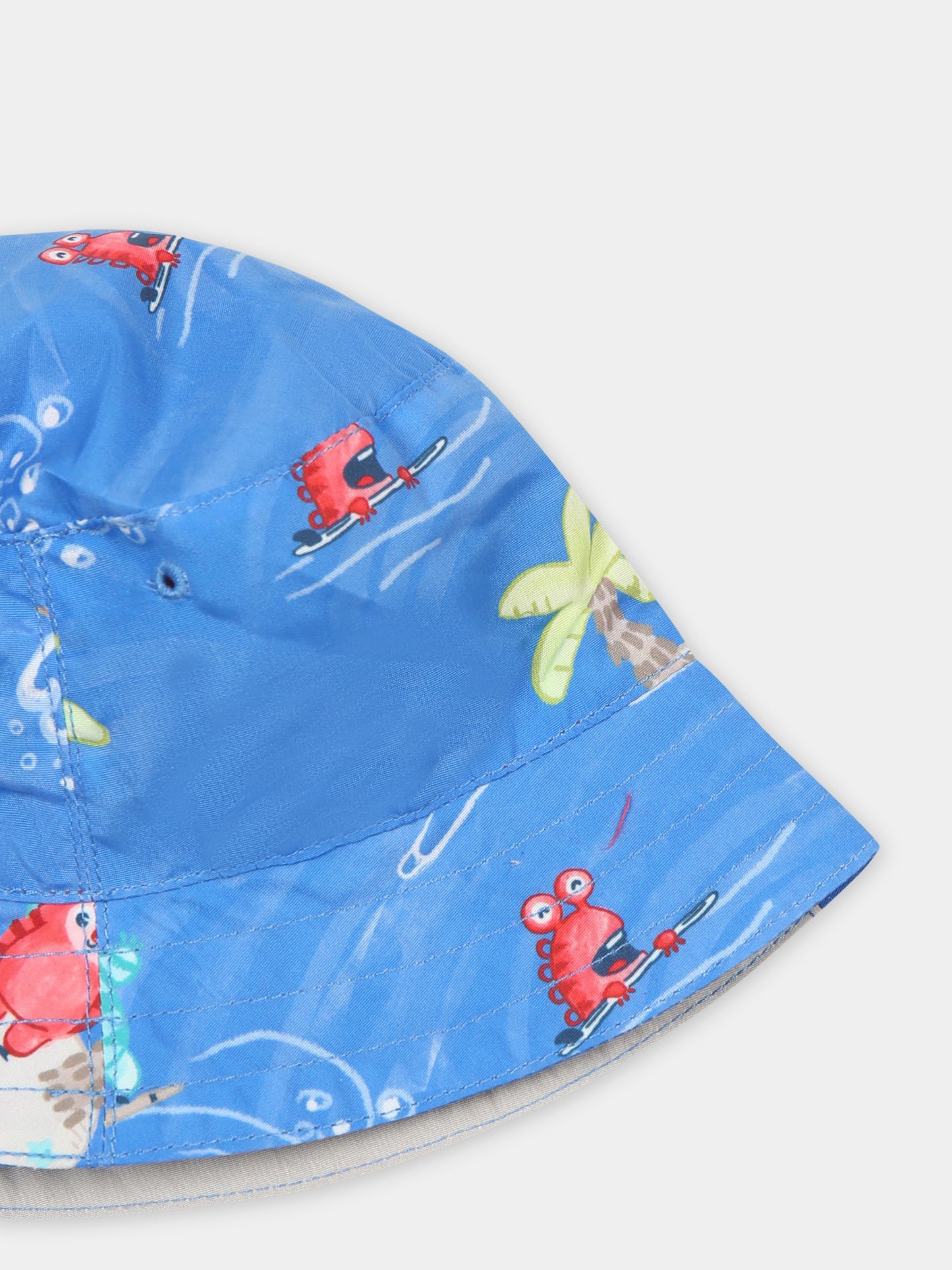 Cloche azzurra reversibile per neonato con stampa mostri,Mayoral,10660 011