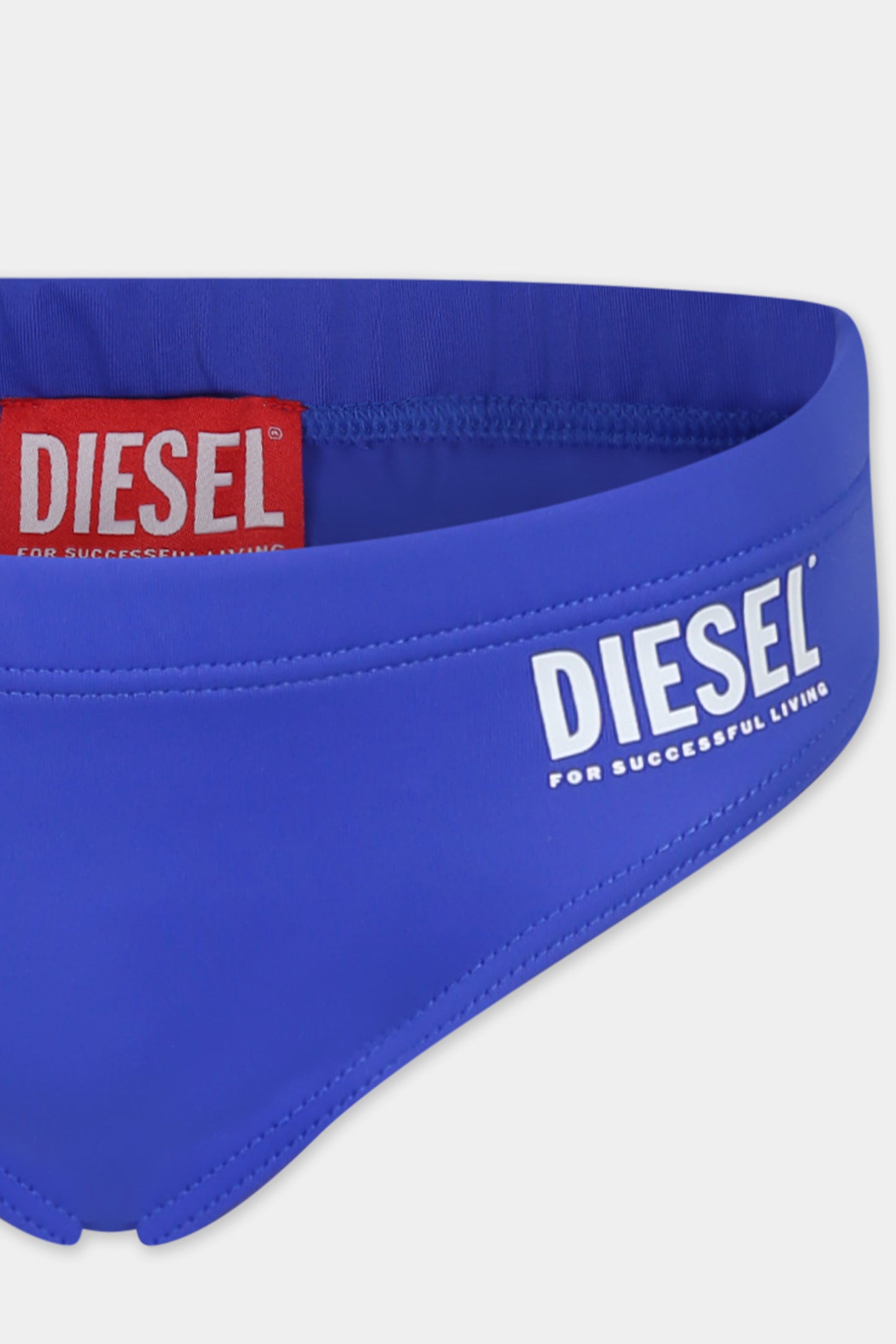 Slip de bain bleu pour garçon avec logo