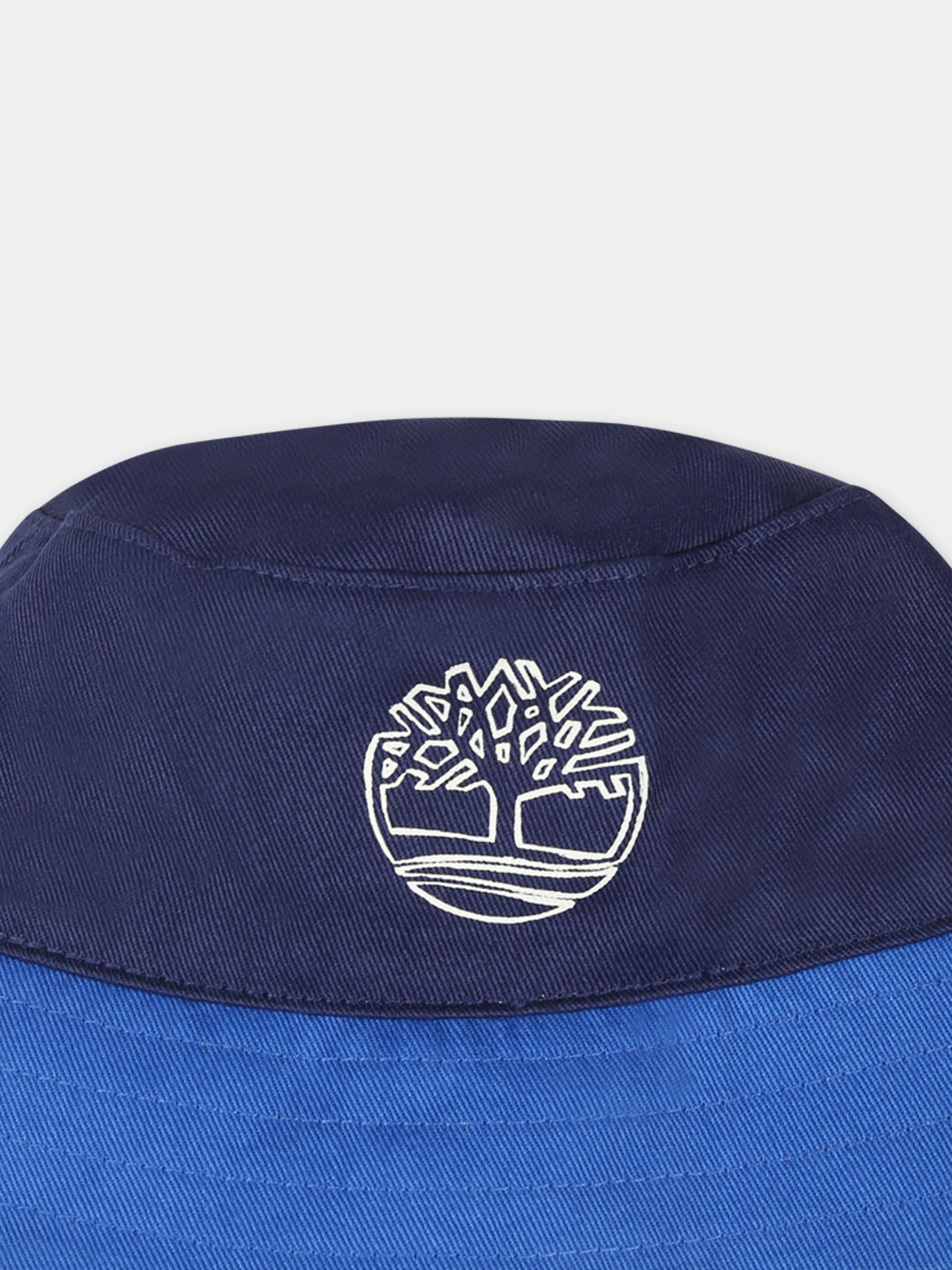 Cloche réversible bleue pour bébé garçon avec logo
