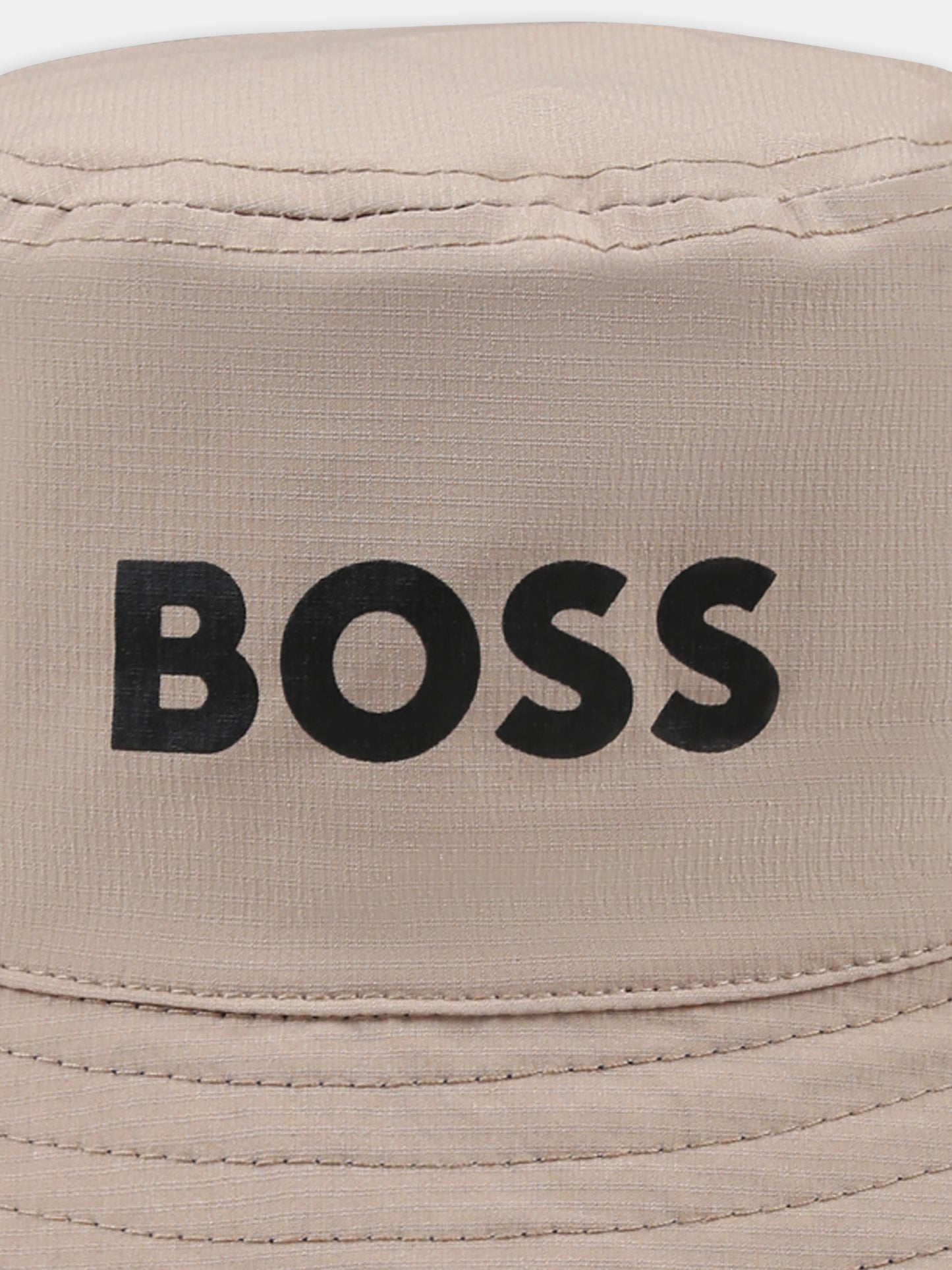 Cloche réversible beige pour garçon avec logo