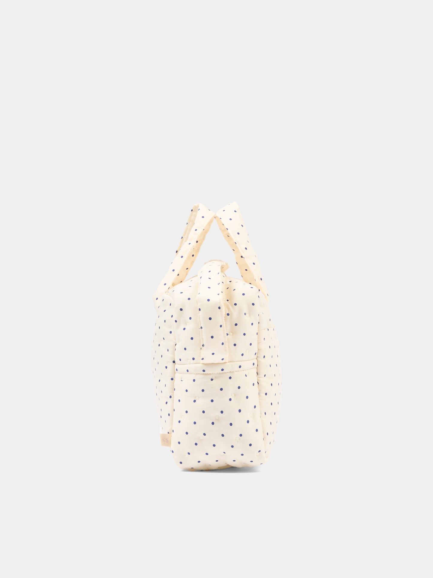 Sac à jeux sensoriels ivoire à pois pour fille