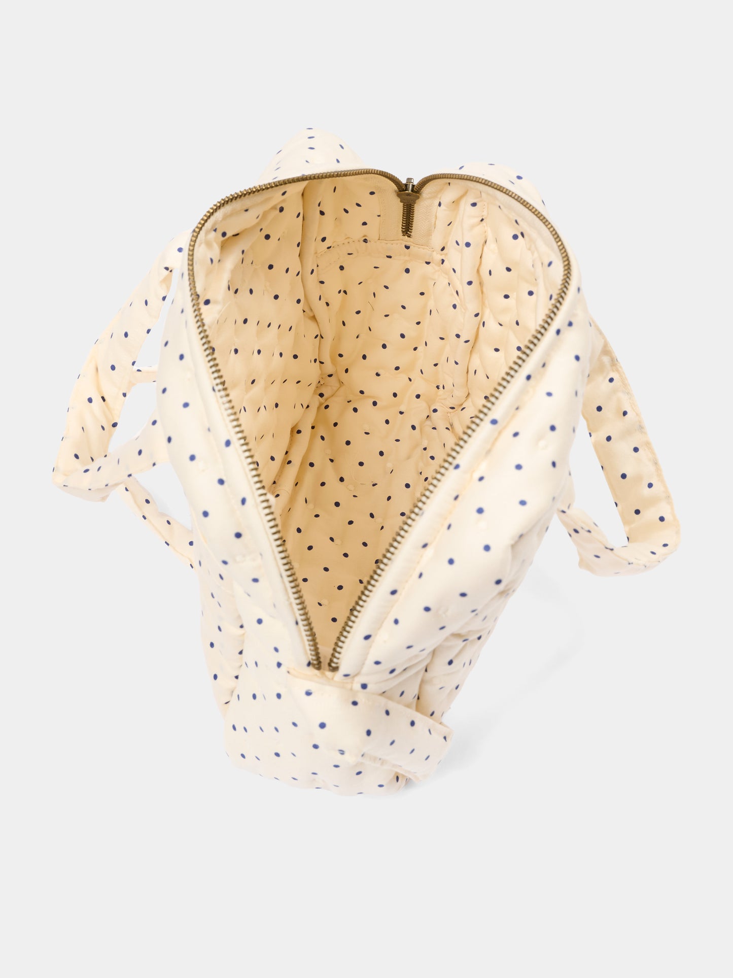Sac à jeux sensoriels ivoire à pois pour fille