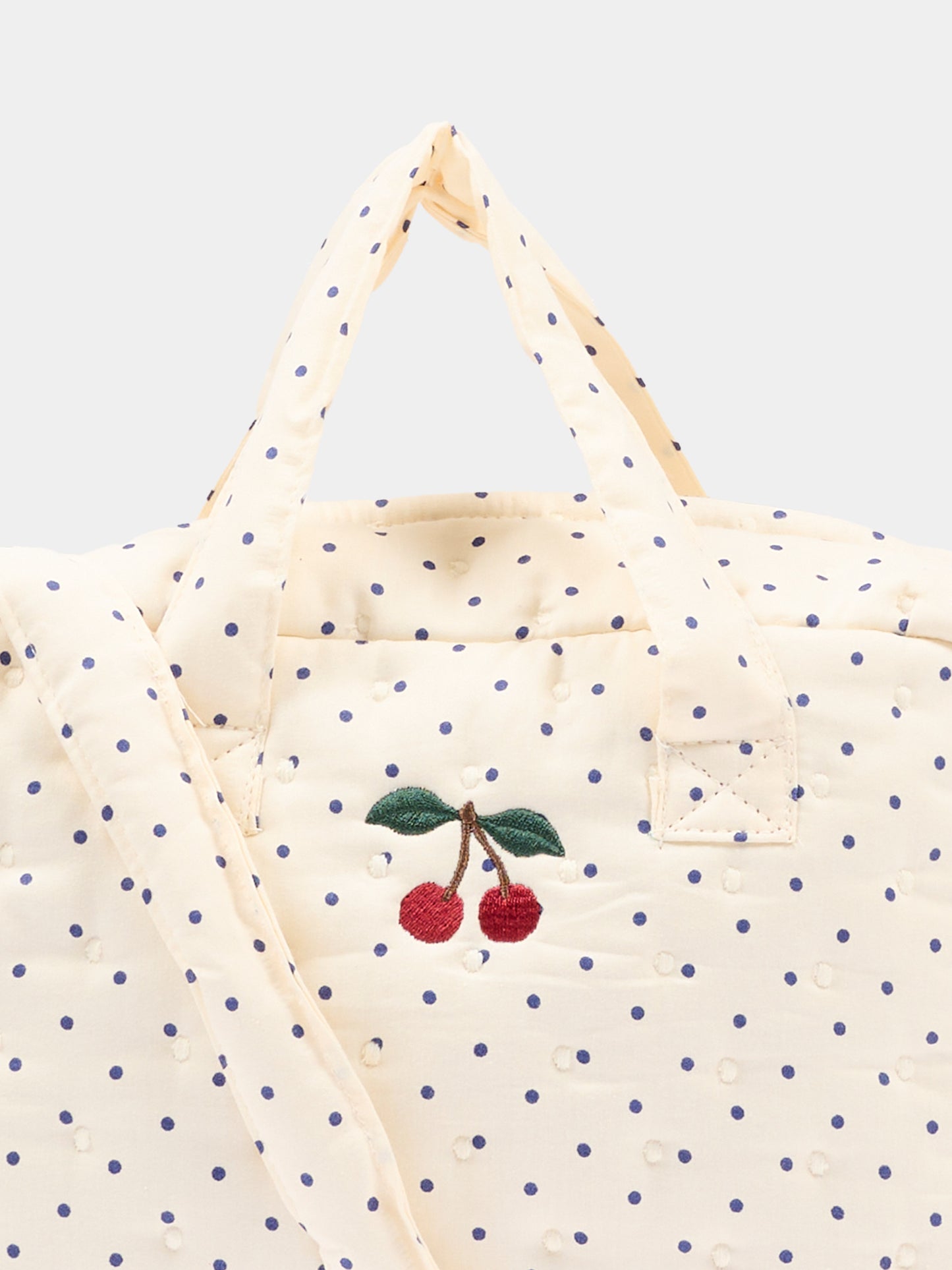 Sac à jeux sensoriels ivoire à pois pour fille