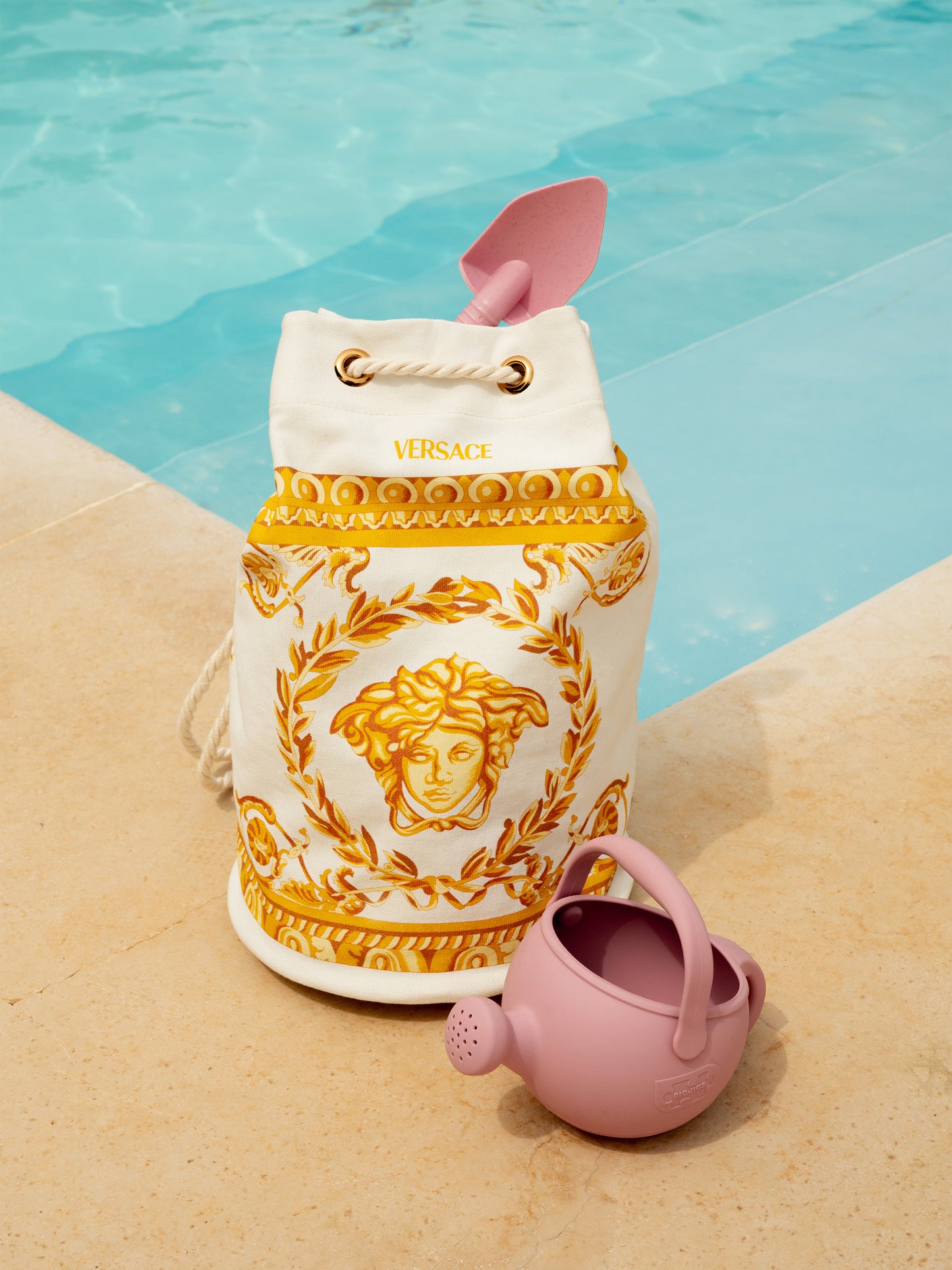 Arrosoir rose pour enfants