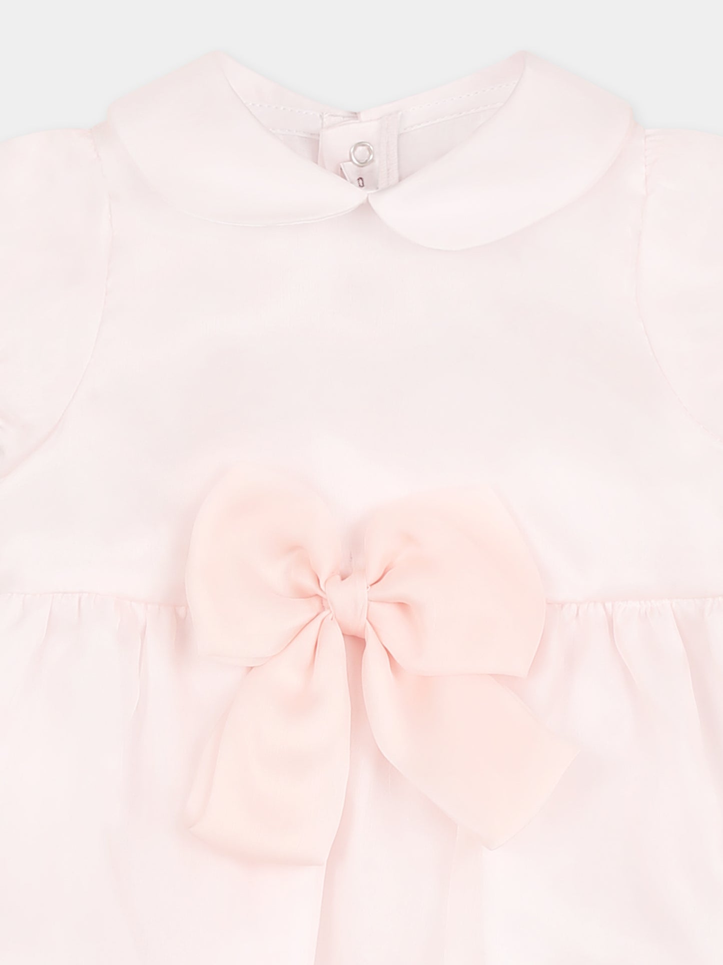 Barboteuse rose pour bébé fille avec noeud