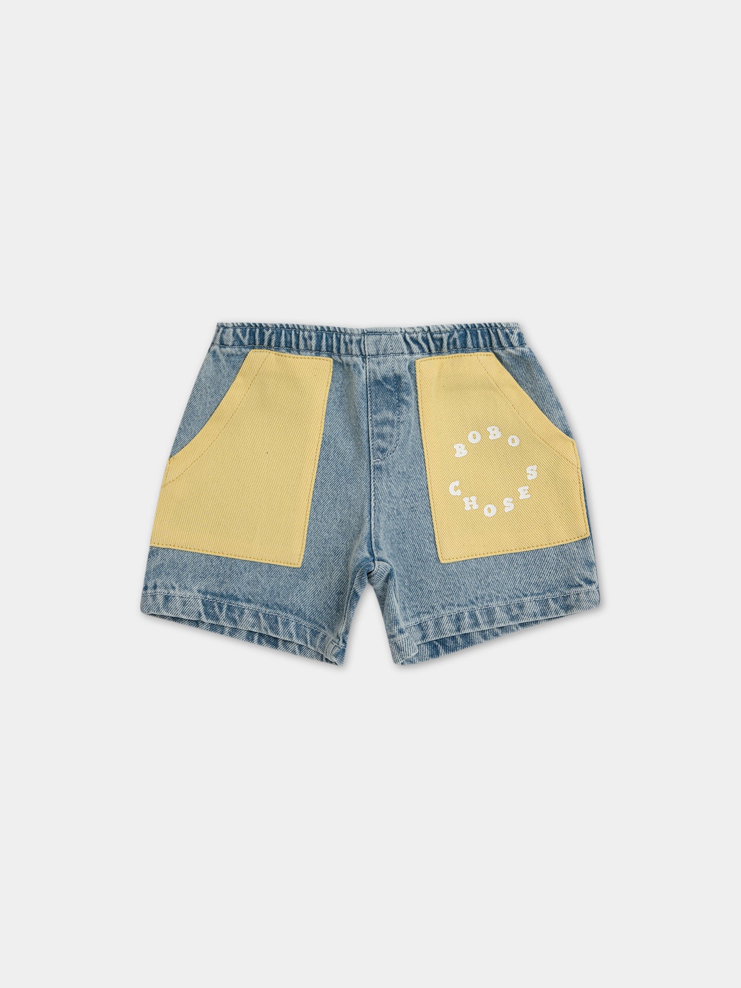 Shorts in denim per neonato con tasche gialle e logo,Bobo Choses,124AB081