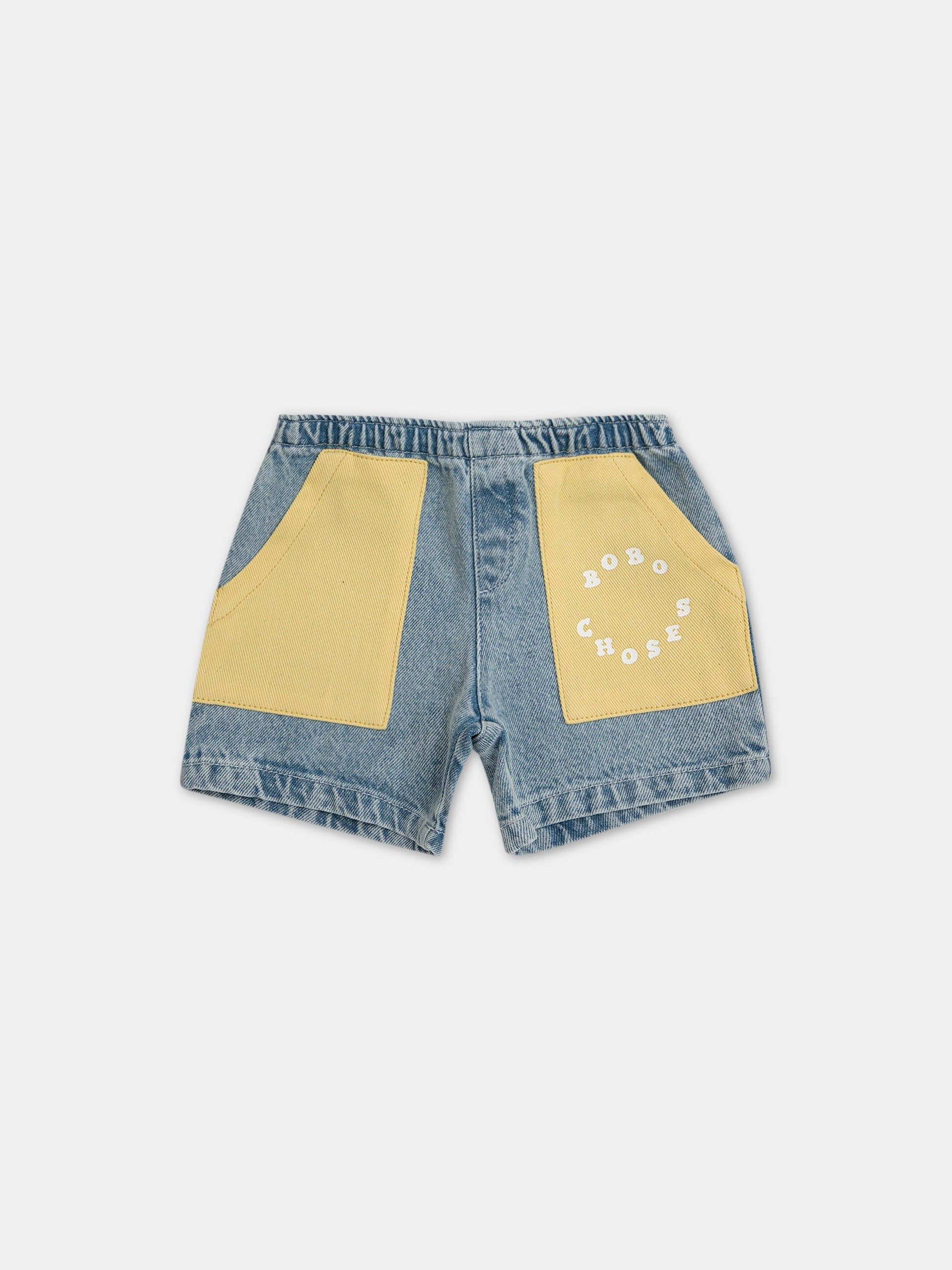 Shorts in denim per neonato con tasche gialle e logo,Bobo Choses,124AB081